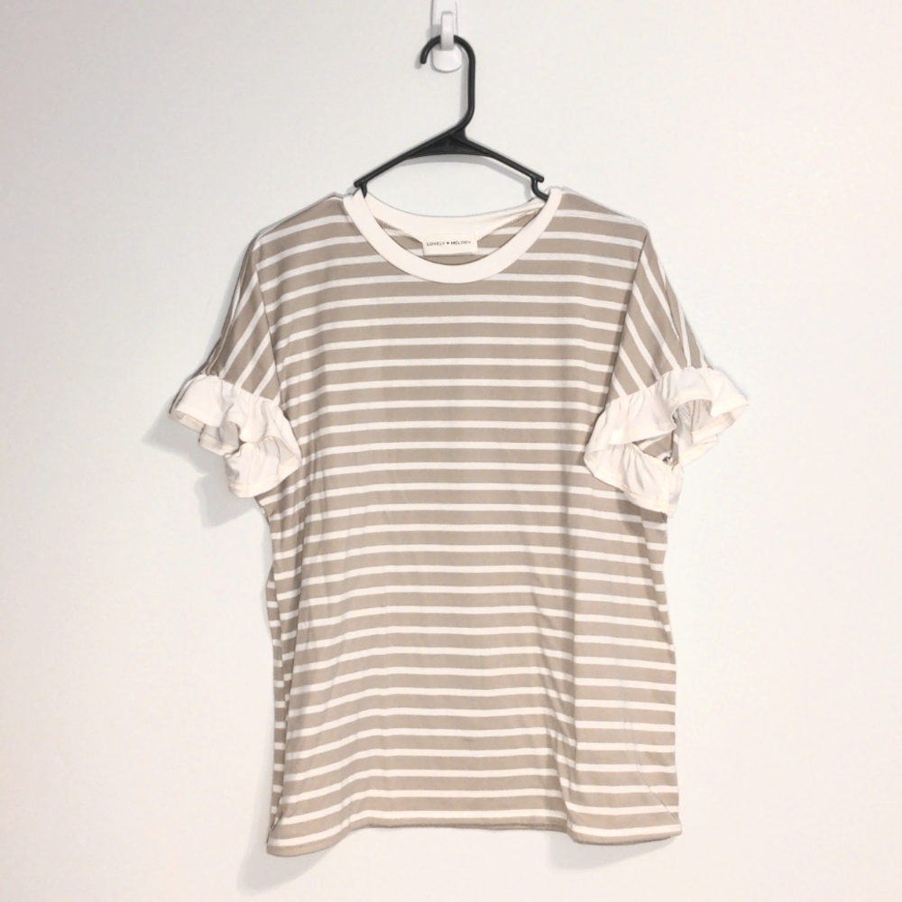 Large women's blouse with ruffle sleeves